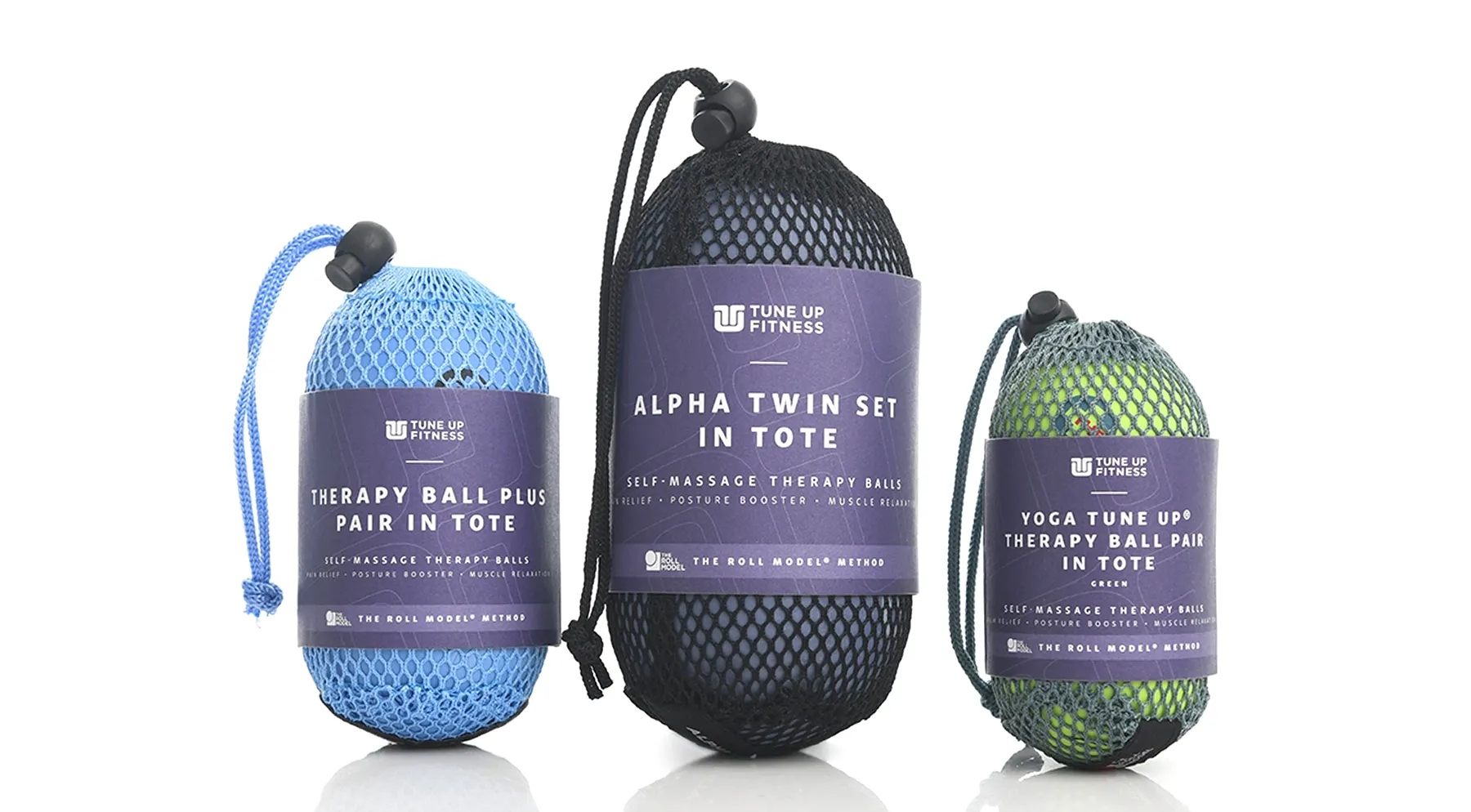 Pairs of massage balls in three different sizes, in totes.